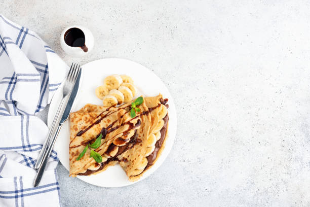 istock Banana and hazelnut chocolate spread filled crepes 1132230750