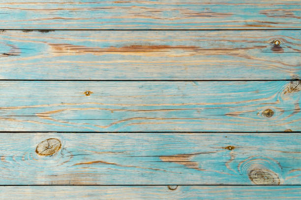 istock Faded blue wooden planks background 1132232380