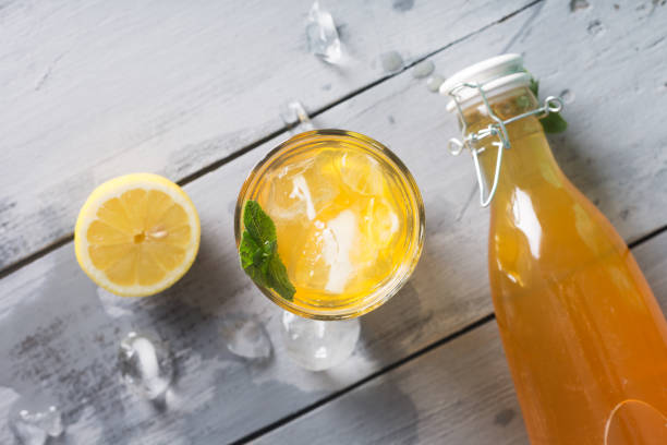 Kombucha lemonade is a fermented drink made from tea and lemon, produced using culture SCOBY stock photo