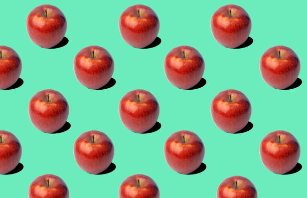 istock Fresh apples (apple) pattern on green background. Minimal concept. Summer minimal concept. Flat lay 1132234569