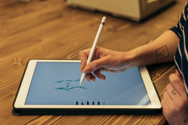 istock Female designer using graphic tablet and stylus pen 1132234889