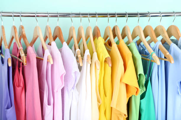 istock Fashion dresses hanging on mint background 1132236396