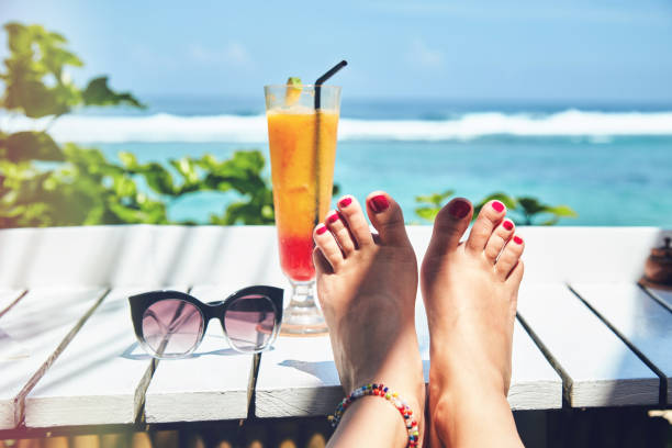 istock Cocktail and cellphone on the wooden table. Summer concept. 1132236457
