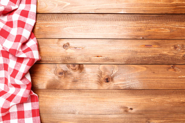 istock Red napkin on brown wooden table 1132240031