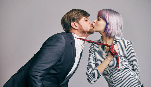 30+ Office Love Affair Concept With Woman Pulling Tie Stock Photos,  Pictures & Royalty-Free Images - iStock