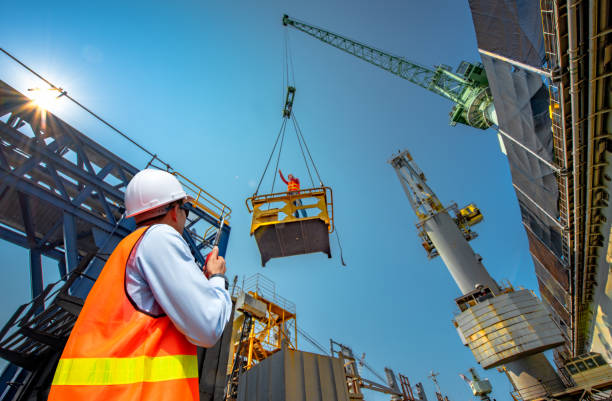 assume um risco no trabalho - crane - fotografias e filmes do acervo