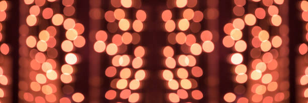 istock Defocused or blurred image of multi-colored lights in the city streets. Abstract background, selective focus. 1132248558