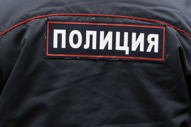 istock Russian policeman's back close up with an emblem 1132249550