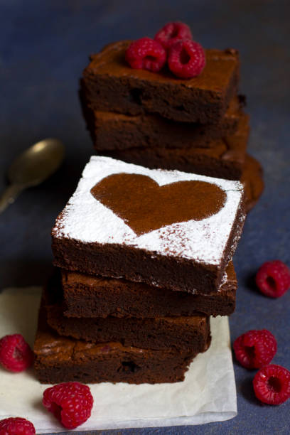 istock Raspberry Brownie, Valentine's Day, on dark blue background 1132250256
