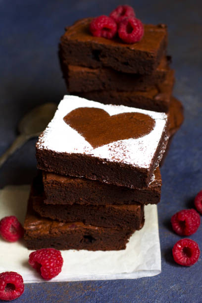 istock Raspberry Brownie, Valentine's Day, on dark blue background 1132250419