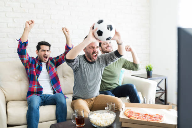 istock Excitement Overloaded For Soccer Game 1132256229