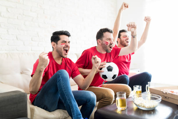 istock Fans On Cloud Nine As Their Team Wins The Match 1132256263