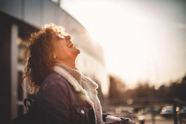istock Curly girl drinking coffee 1132256498
