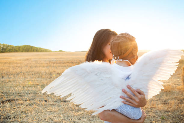 istock Boy and his mother playing the aviator. 1132260428