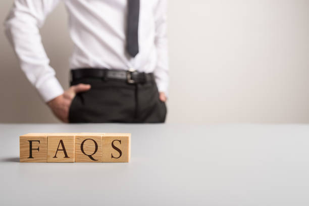 istock Wooden cubes spelling FAQS 1132263685