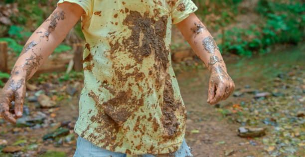 istock Girl playing in mud 1132264025
