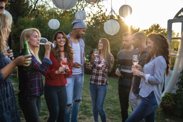 istock Friendly group of people having fun at a party 1132264095
