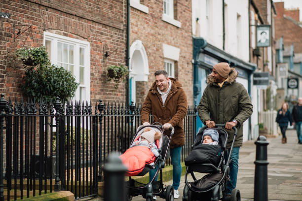 istock Friends Walking with Their Babies in Tynemouth, UK 1132265723
