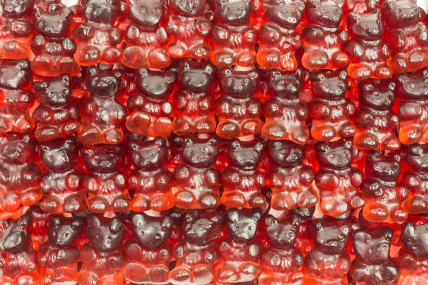 gummy candy background - jellied cranberries fotos imagens e fotografias de stock