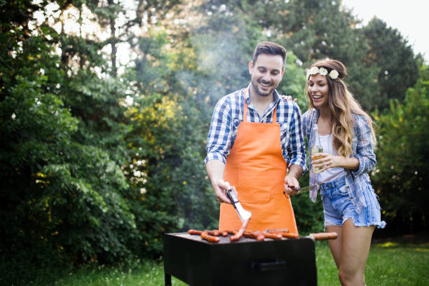 istock Group of friends having fun in nature doing bbq 1132266319