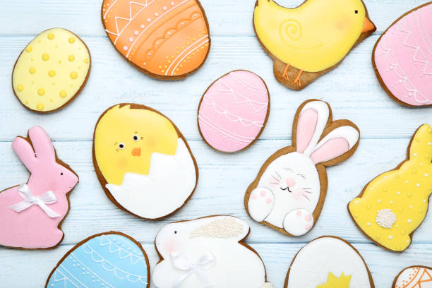 istock Easter gingerbread cookies on wooden table 1132272360