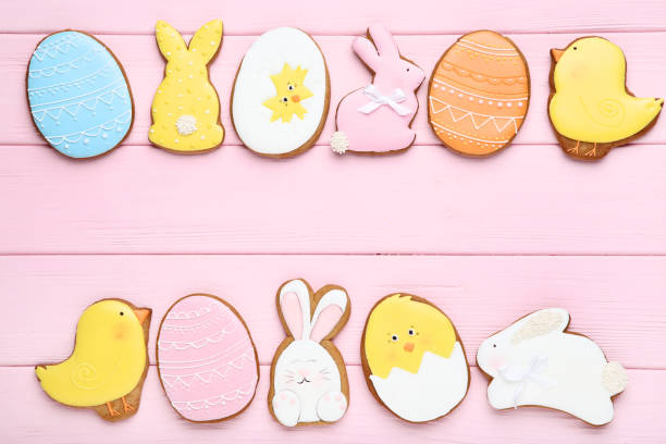 istock Easter gingerbread cookies on pink wooden table 1132272500