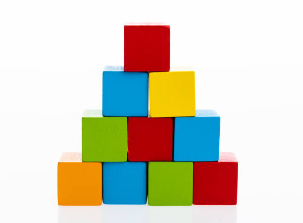istock Pyramid of blocks on white background 1132276023