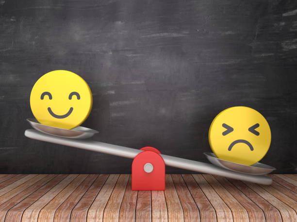Seesaw Scale with Emoticons on Chalkboard Background - 3D Rendering stock photo