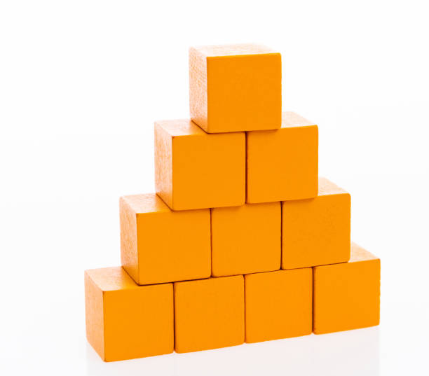istock Pyramid of blocks on white background 1132278678