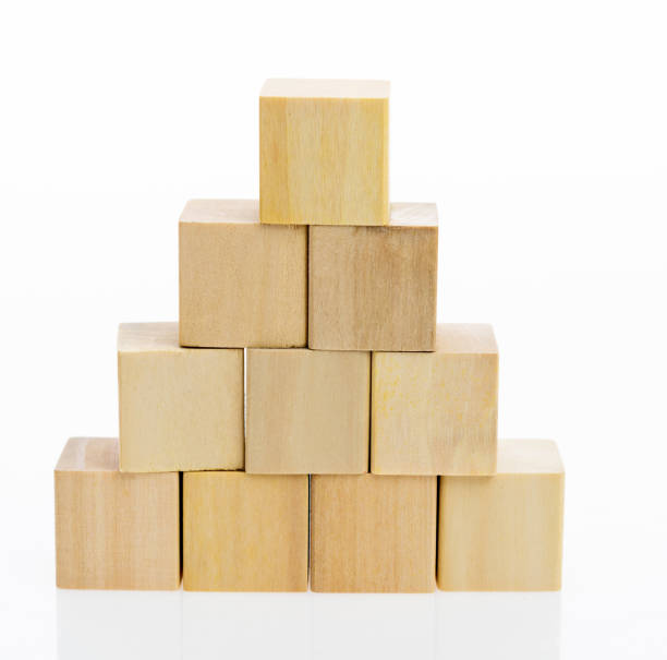 istock Pyramid of blocks on white background 1132278815