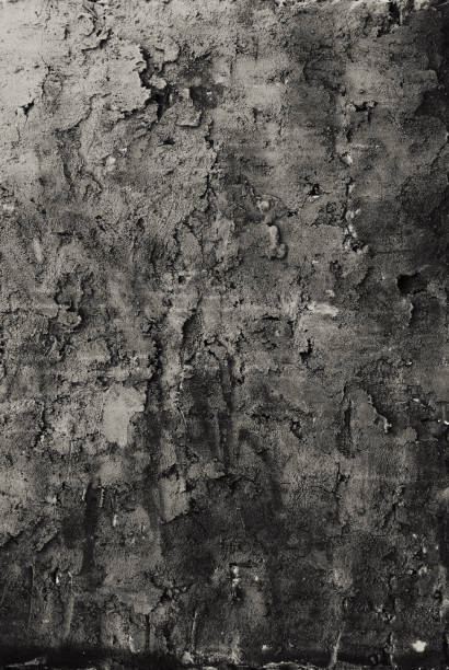 istock vertical background of old uneven dark gray plaster 1132279128