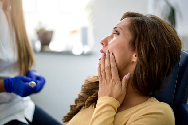 young woman with toothache - dental light dental equipment hospital professional occupation imagens e fotografias de stock