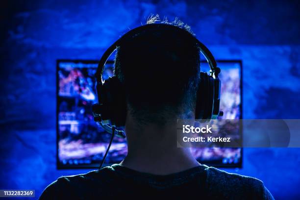 Men Playing Video Games Stock Photo - Download Image Now - Video Game, Gamer, Playing