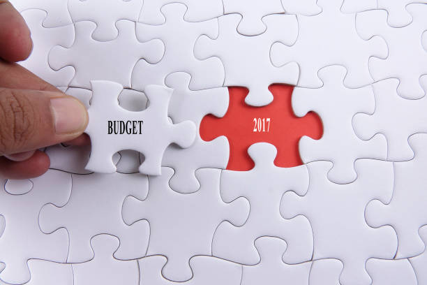 istock Close-Up Of Hand Holding Jigsaw Piece With Text 1132284052