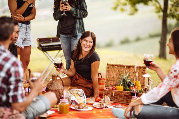 istock friends sitting on the carpet doing a bbq 1132284319