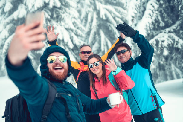 istock Happy Snow Hikers Taking a Selfie In The Mountain 1132285089