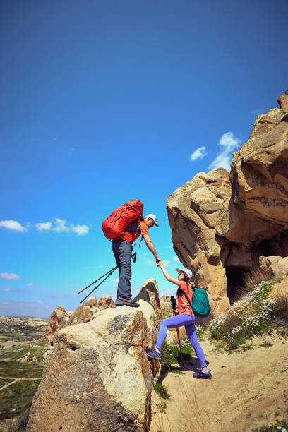 istock Summer hike in the mountains with a backpack and tent. 1132287032