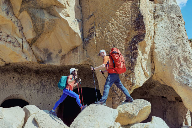 istock Summer hike in the mountains with a backpack and tent. 1132287042