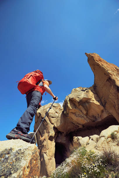 istock Summer hike in the mountains with a backpack and tent. 1132287689