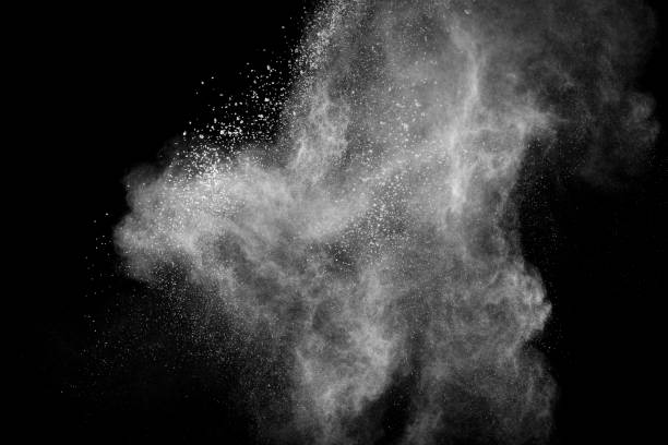 istock White powder explosion cloud against black background.White dust particles splash. 1132287695