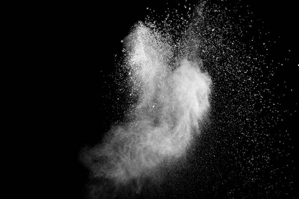 istock White powder explosion cloud against black background.White dust particles splash. 1132287703