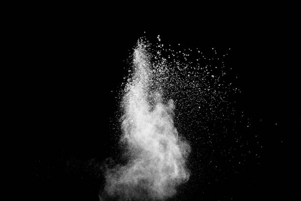 istock White powder explosion cloud against black background.White dust particles splash. 1132287720