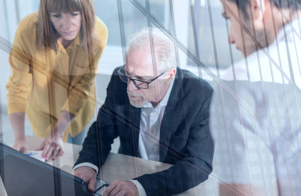 istock Business people working together, double exposure 1132289563
