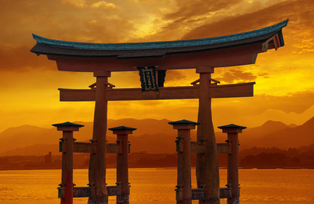 Hiroshima, Japan - May, 2018: closeup of floating Torii gate at sunset