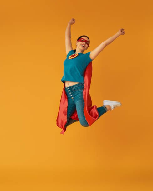 istock woman in superhero costume 1132292658