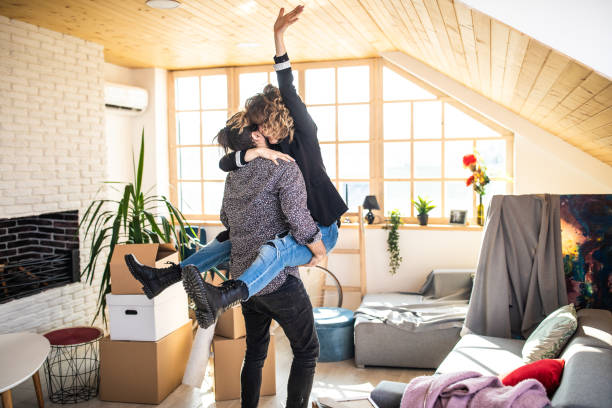 istock Couple celebrating moving in into new apartment 1132294704