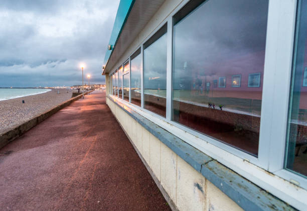istock Coast of Normandy reflected in the window glass 1132295546