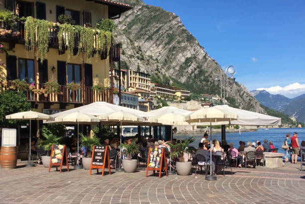 Beautifull flowers decorating old houses in Limone sul Garda, Italy.
