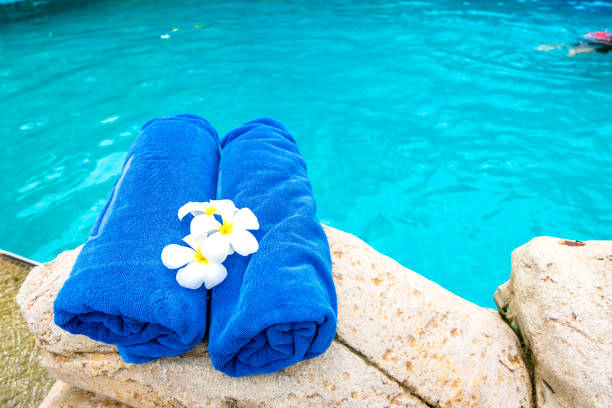 istock The Rolled towel placed on the bed in the pool 1132308789