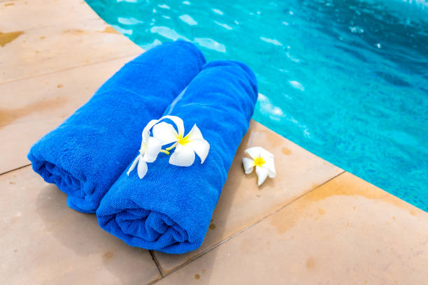 istock The Rolled towel placed on the bed in the pool 1132308803